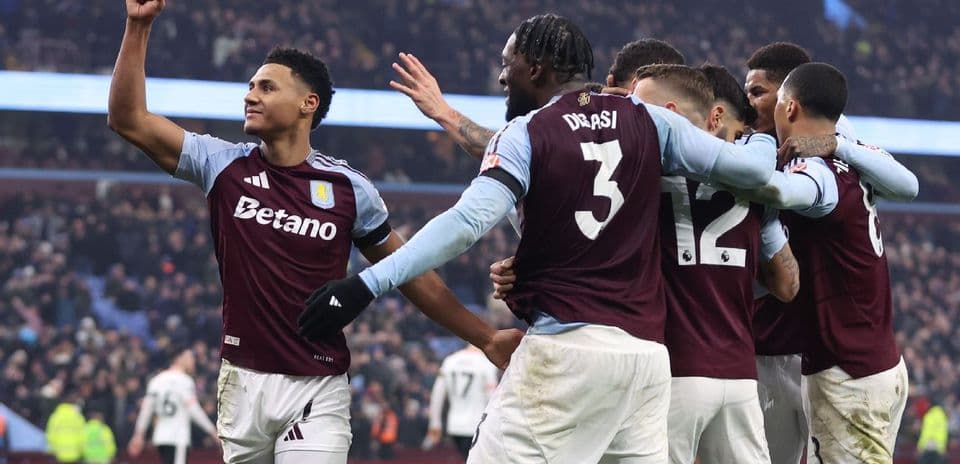 Aston Villa players celebrating a goal during match