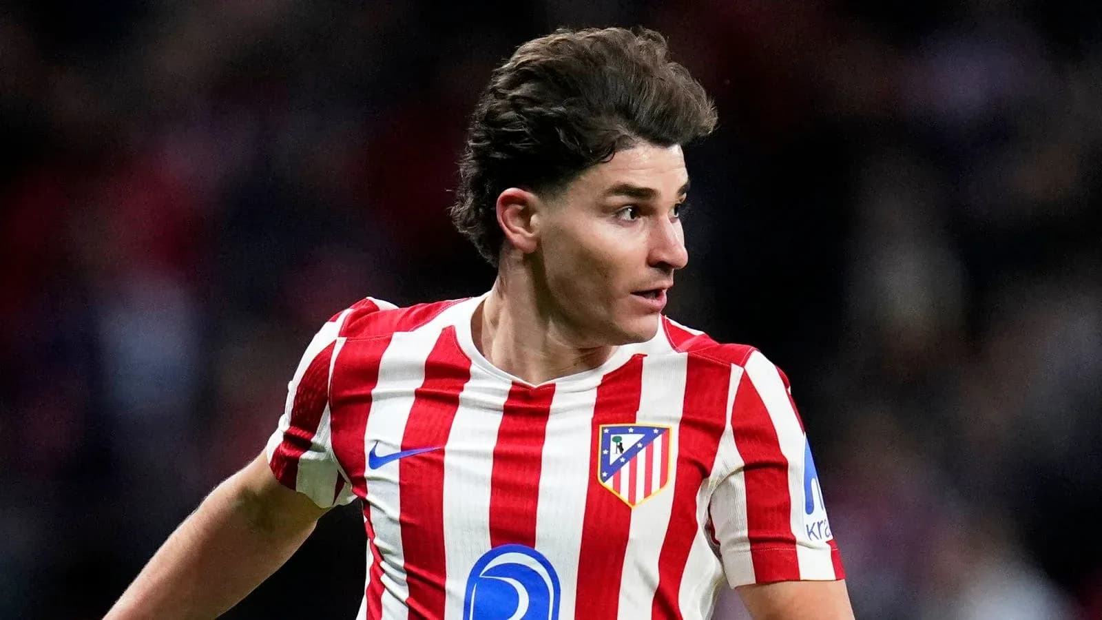 Atletico Madrid player running during a match