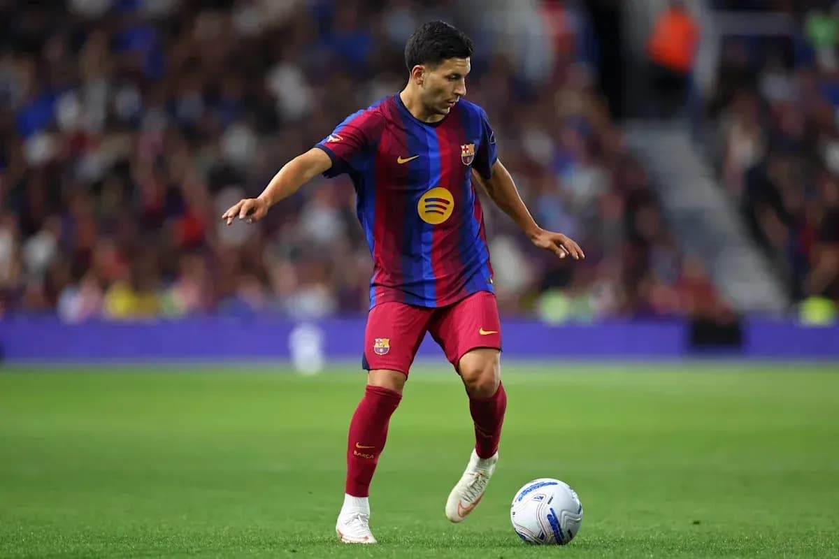 Player dribbling the ball on the pitch