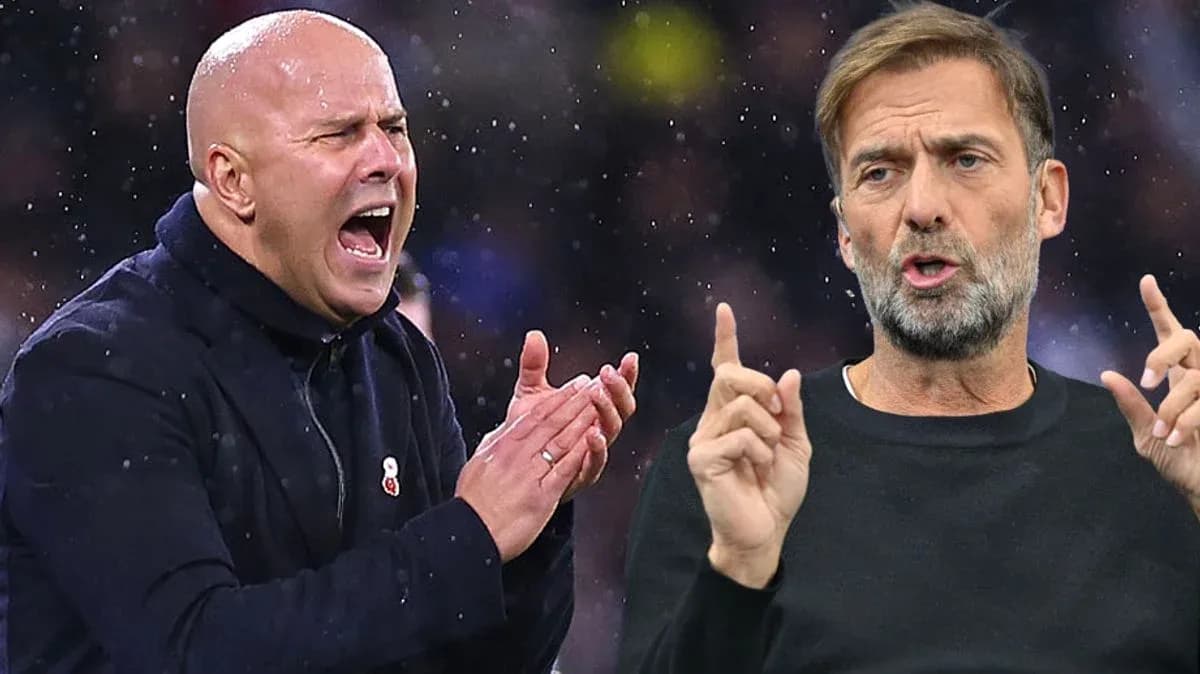 Two football managers reacting during a match