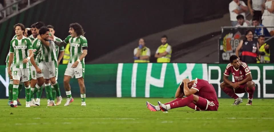 Players reacting after a goal during match