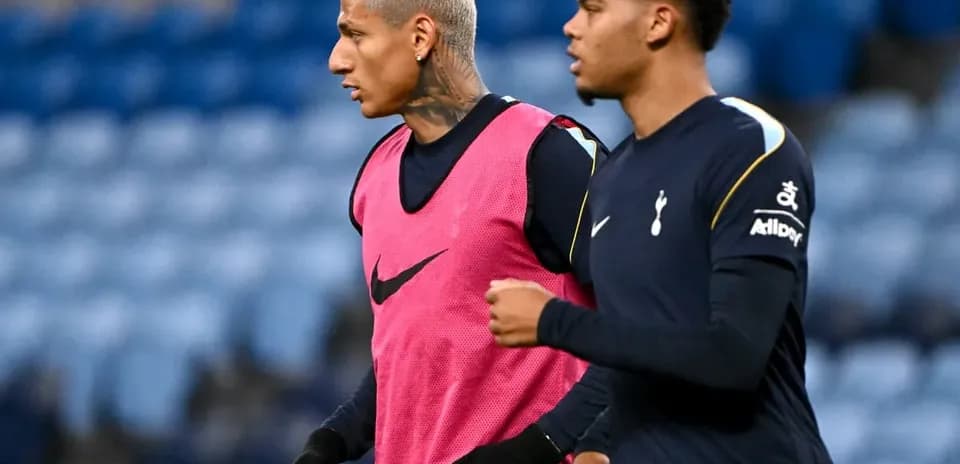 Two Tottenham players warming up before a match