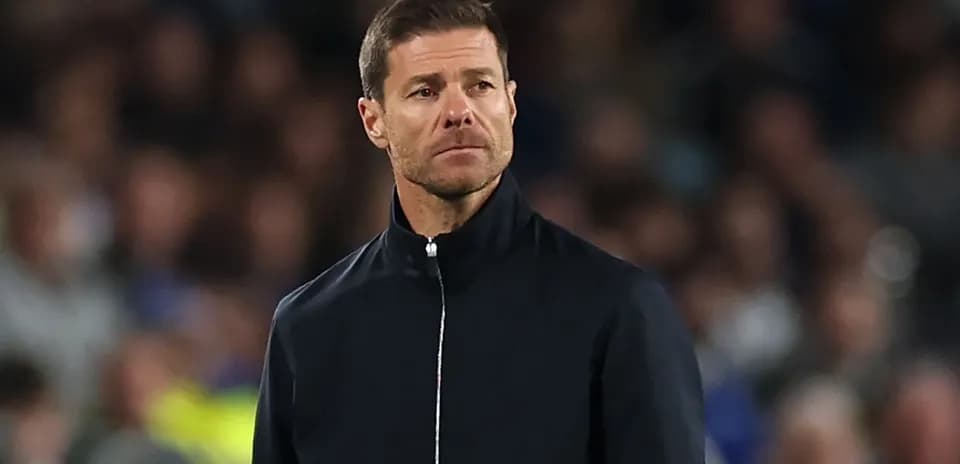 Coach observing match from the sidelines