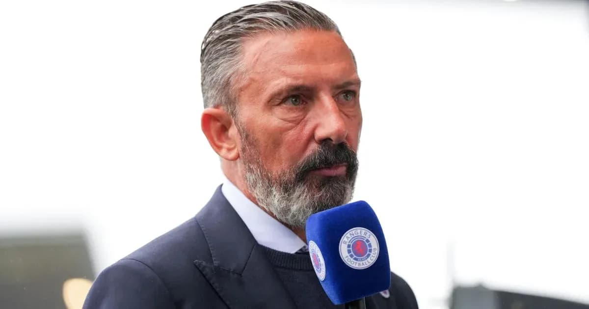 Man speaking into a microphone at an event