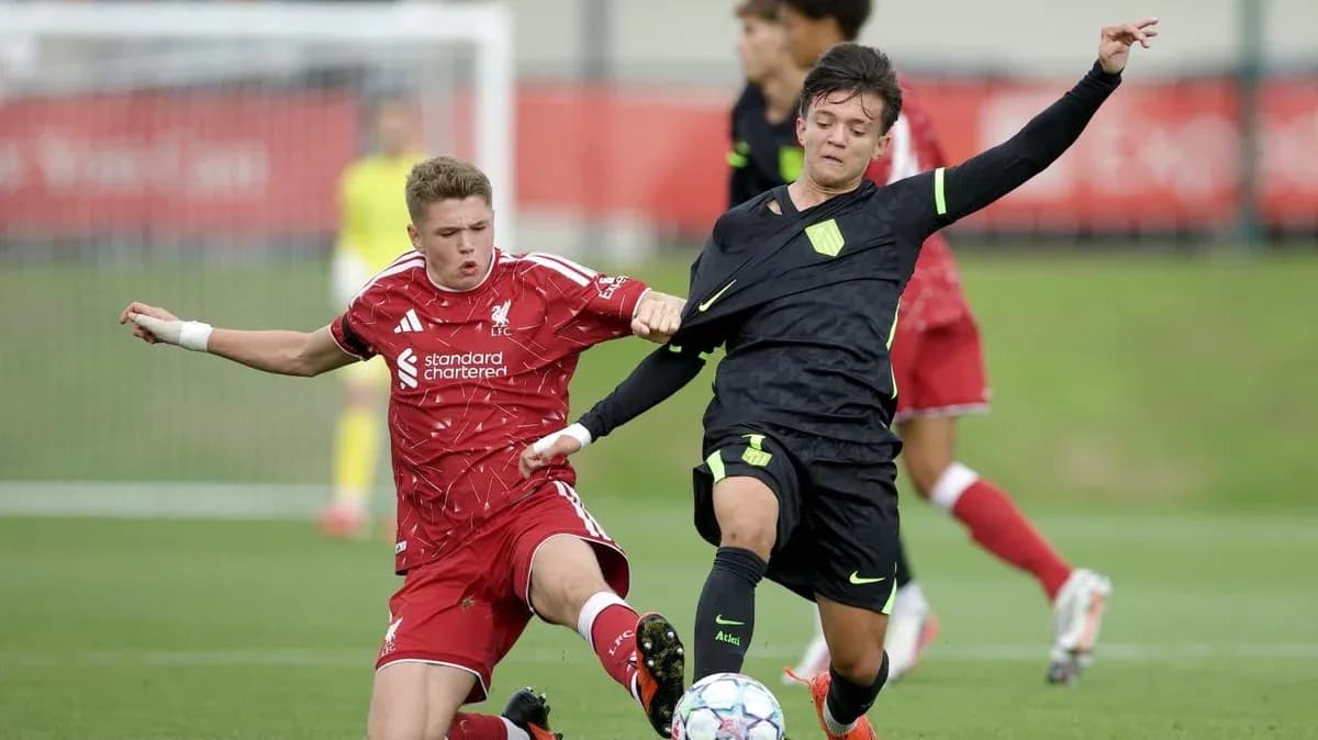 Two players competing for the ball during match