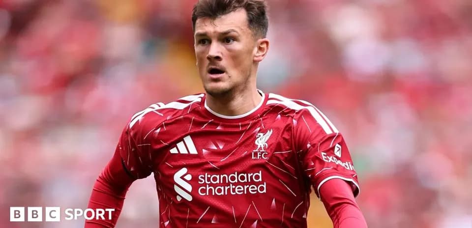 Liverpool player during match in red kit