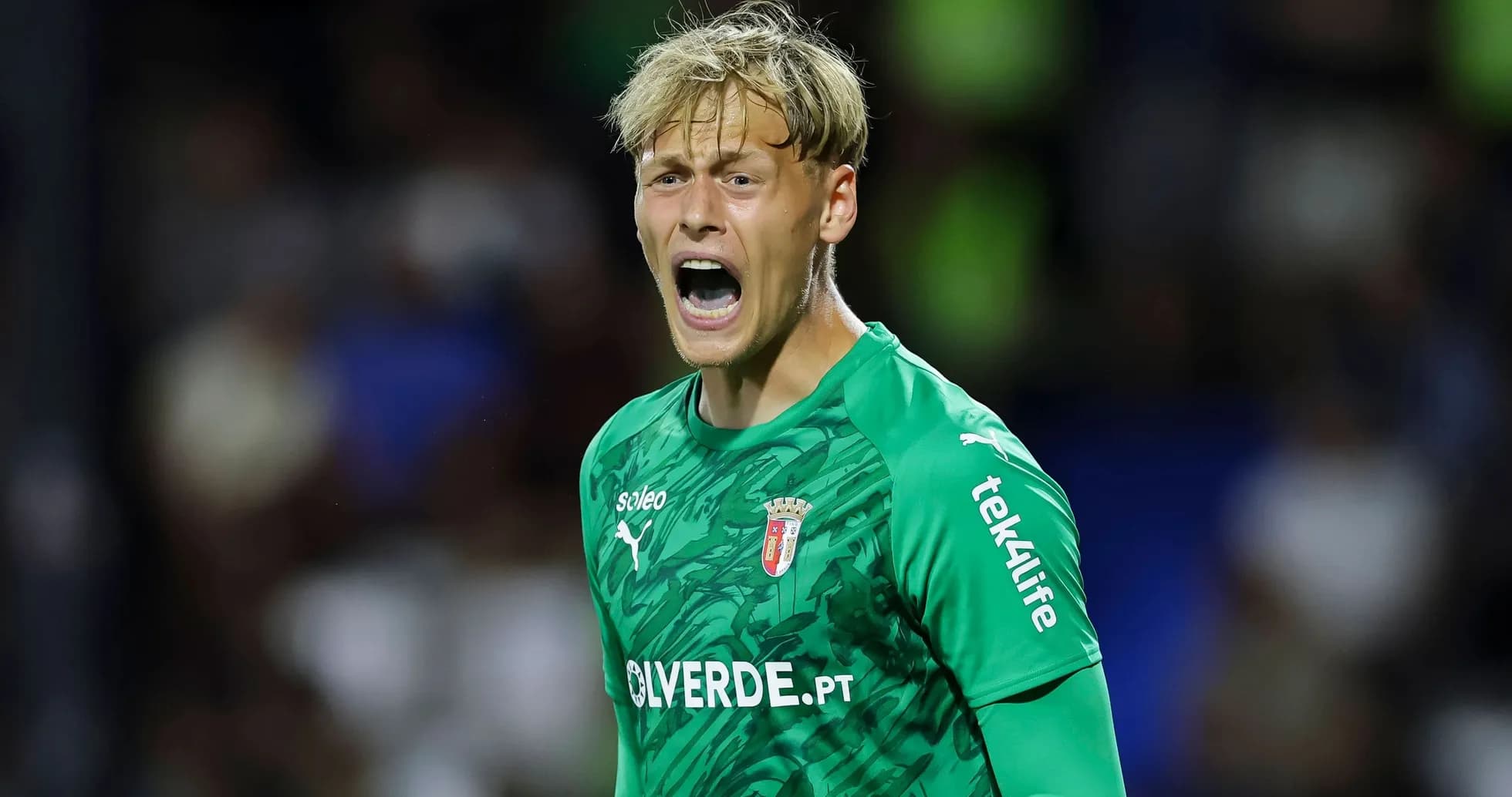 Goalkeeper shouting during a football match