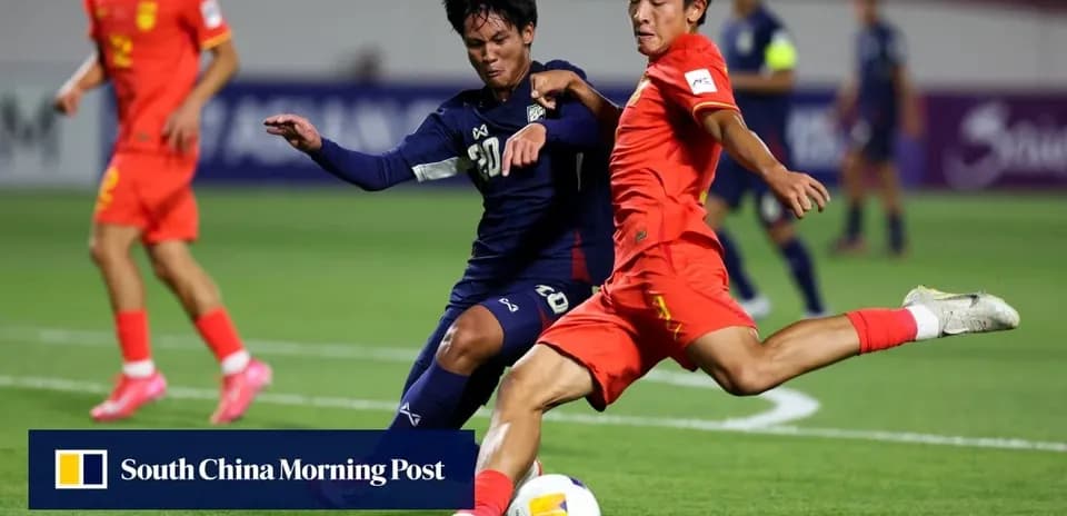 Players challenging for the ball during a match