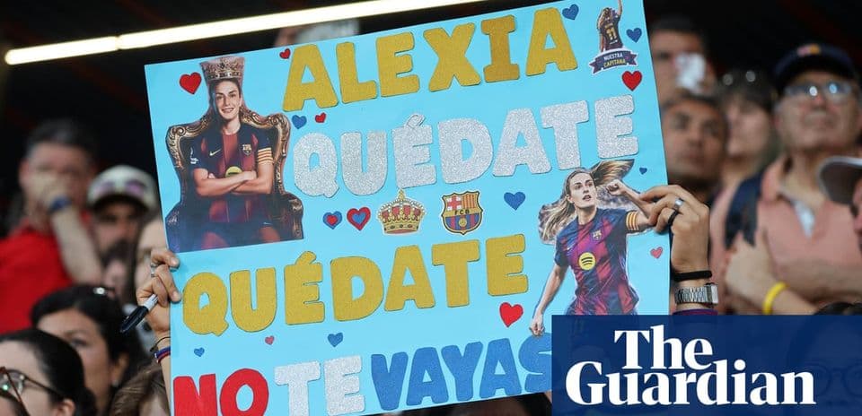 Fan holding sign supporting player at stadium