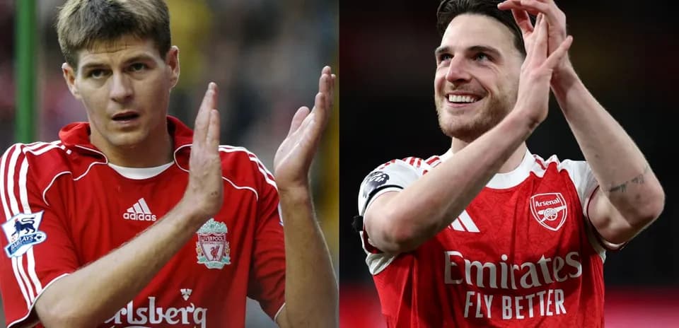 Two football players applauding fans, wearing club jerseys