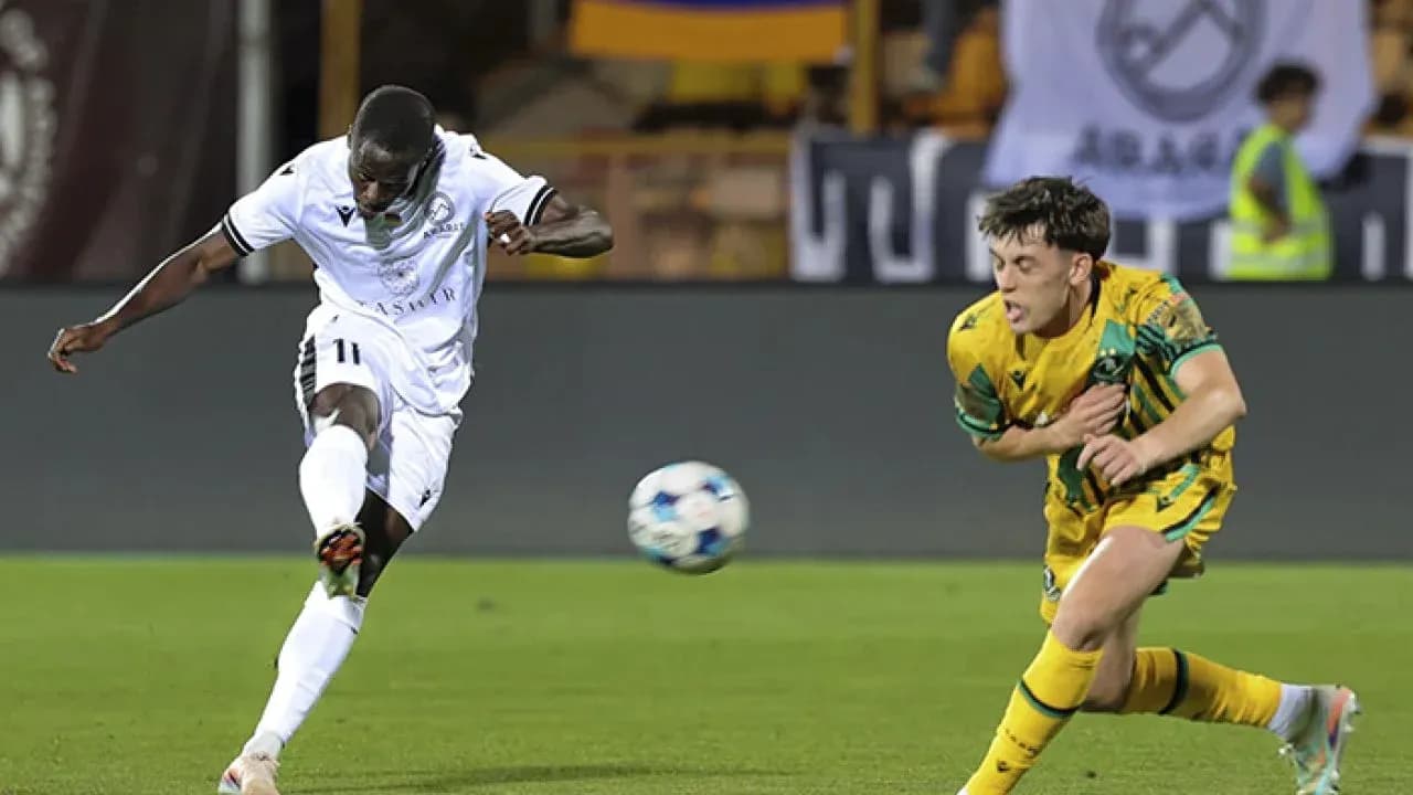 Player shooting the ball during match