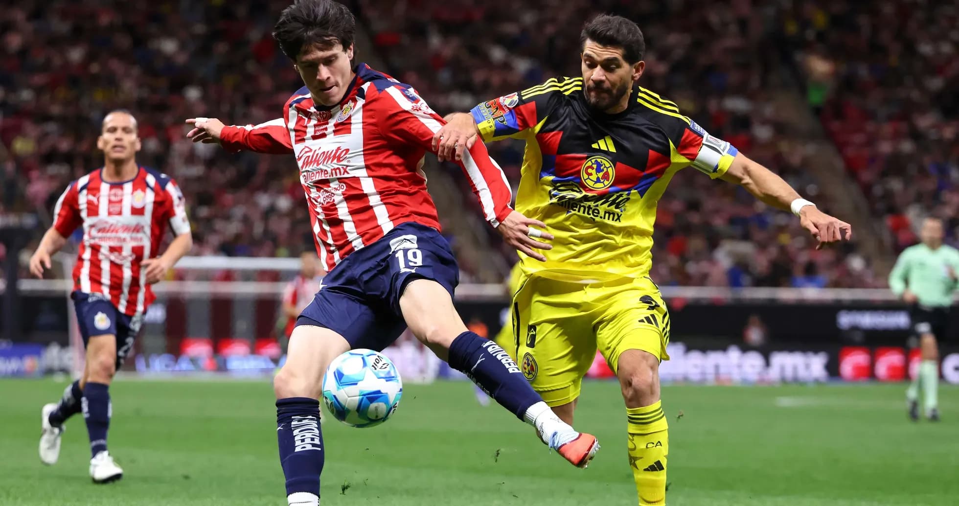 Player kicking ball during Club America vs Chivas match