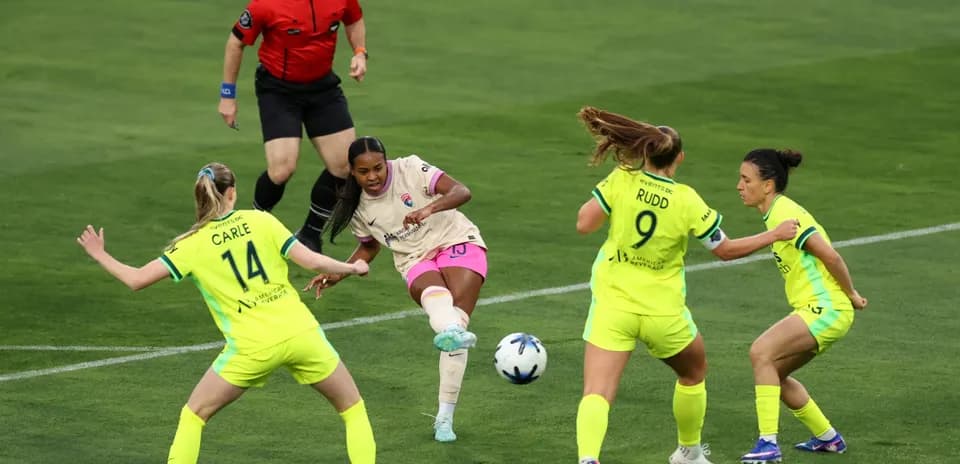 Houston Dash player kicking the ball during match