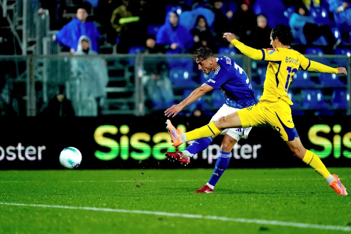 Player kicking ball during Hellas Verona match