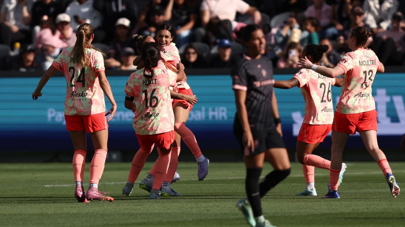 Players celebrating during Portland Thorns match