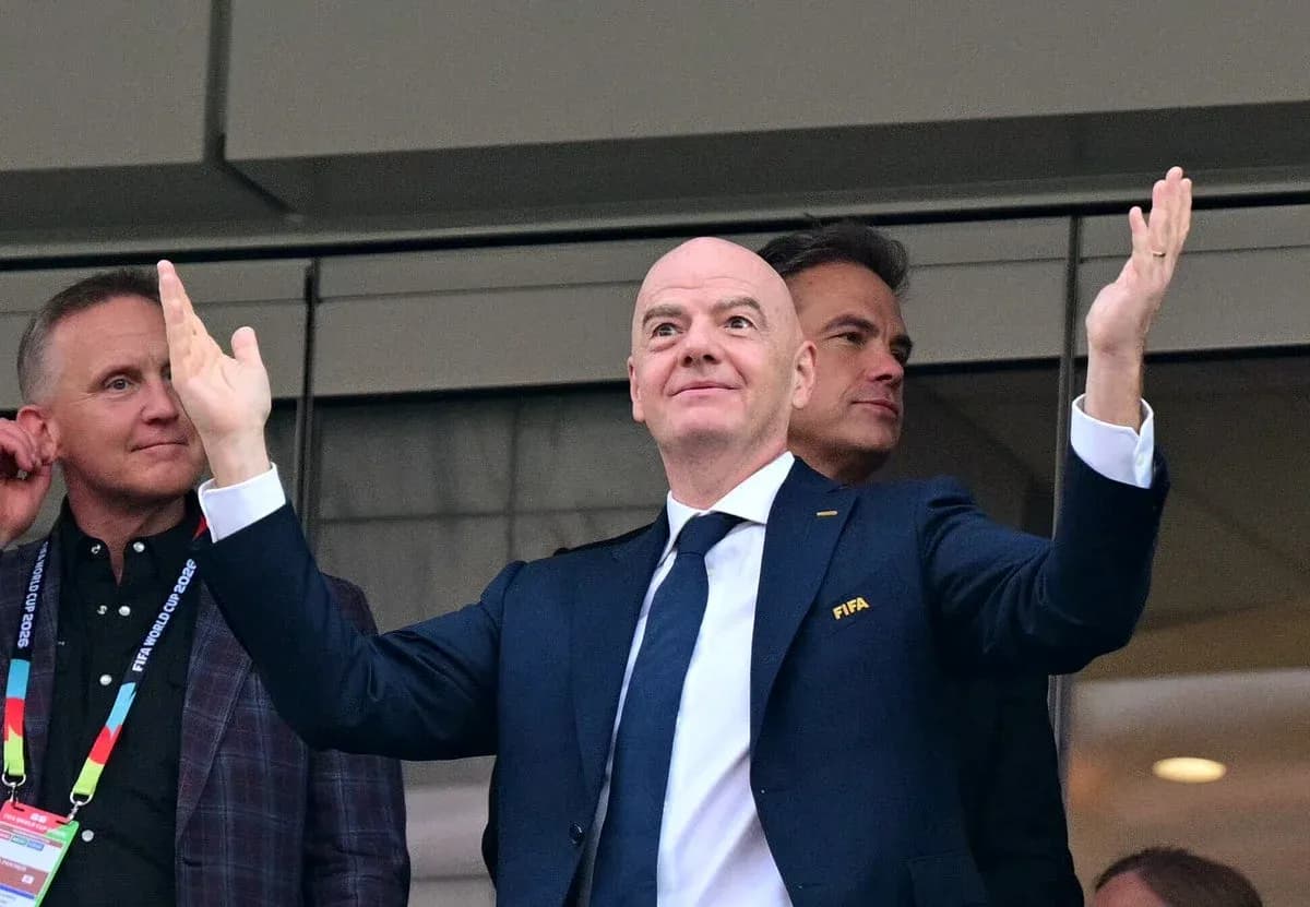 FIFA president gesturing during an event FIFA president gesturing during an event