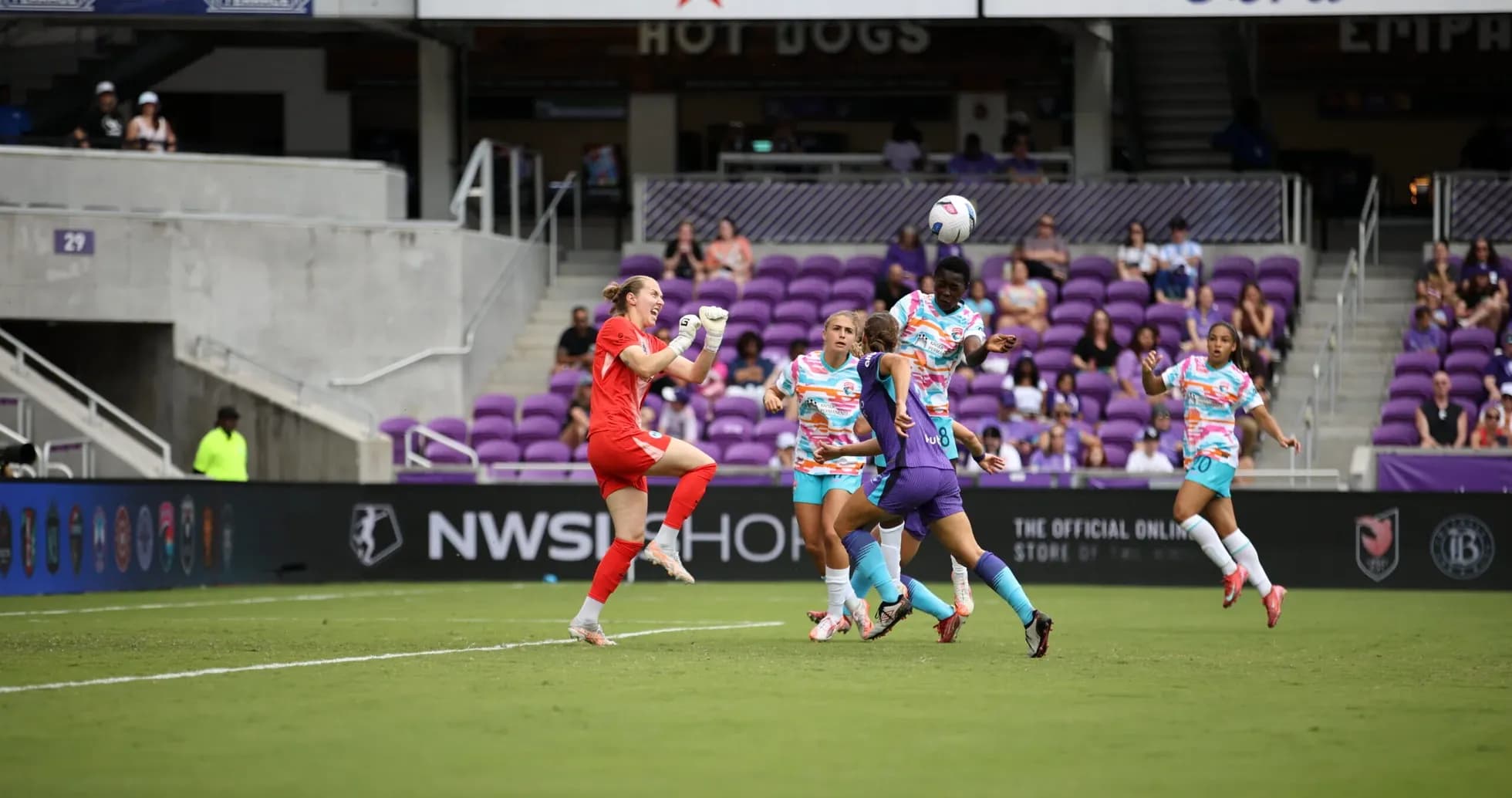 Goalkeeper saving ball during NWSL match Goalkeeper saving ball during NWSL match