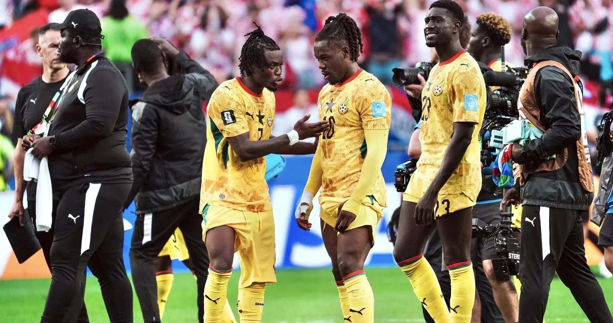 Ghana players discussing on the pitch after match Ghana players discussing on the pitch after match