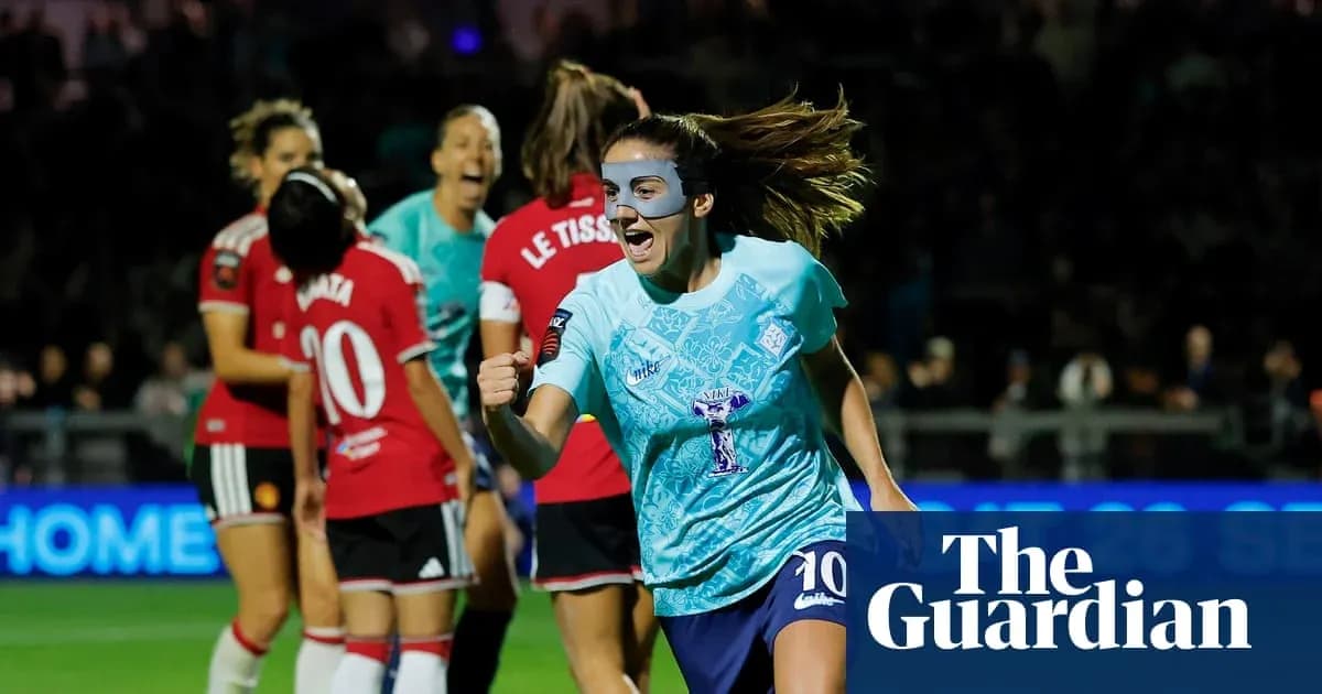Player celebrating a goal with teammates in match Player celebrating a goal with teammates in match