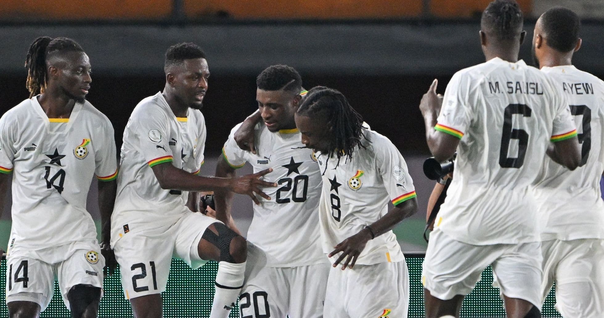 Ghana players celebrating a goal during a match Ghana players celebrating a goal during a match