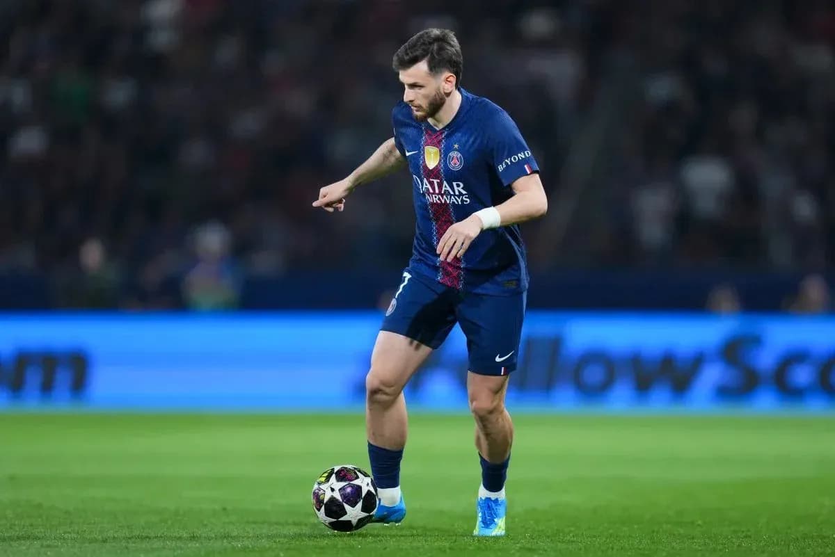 Player dribbling the ball on the pitch Player dribbling the ball on the pitch