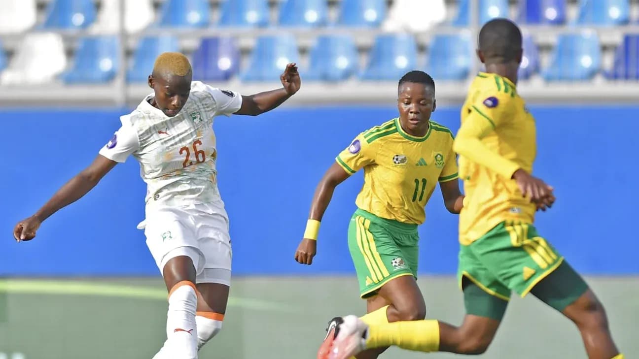 Player from Ivory Coast kicking ball during match Player from Ivory Coast kicking ball during match