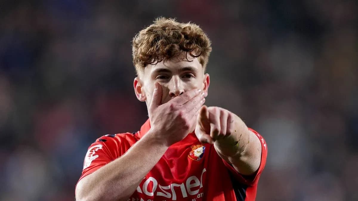 Player celebrating and pointing during a match Player celebrating and pointing during a match