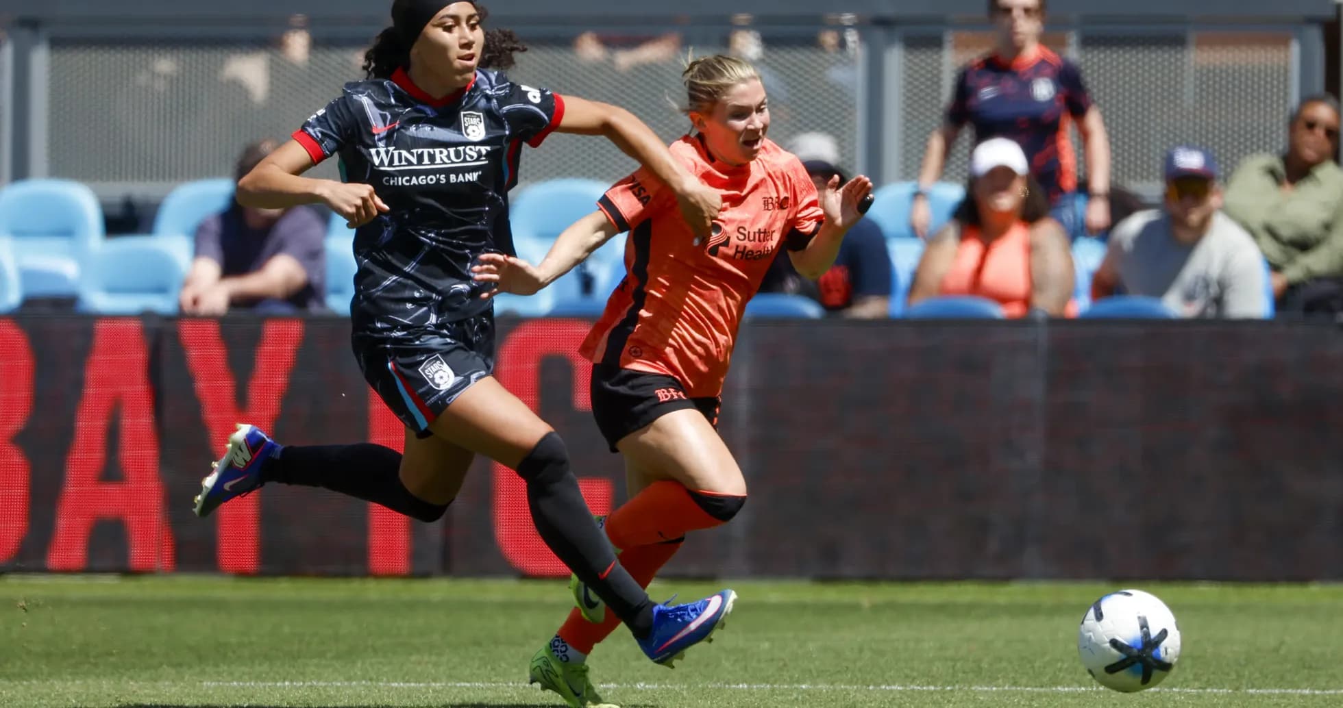 Bay FC player chasing Chicago Red Stars player Bay FC player chasing Chicago Red Stars player