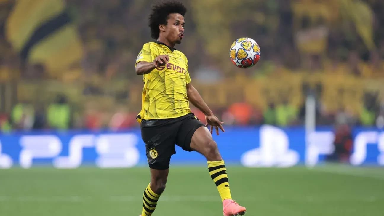 Player controlling the ball during match action Player controlling the ball during match action
