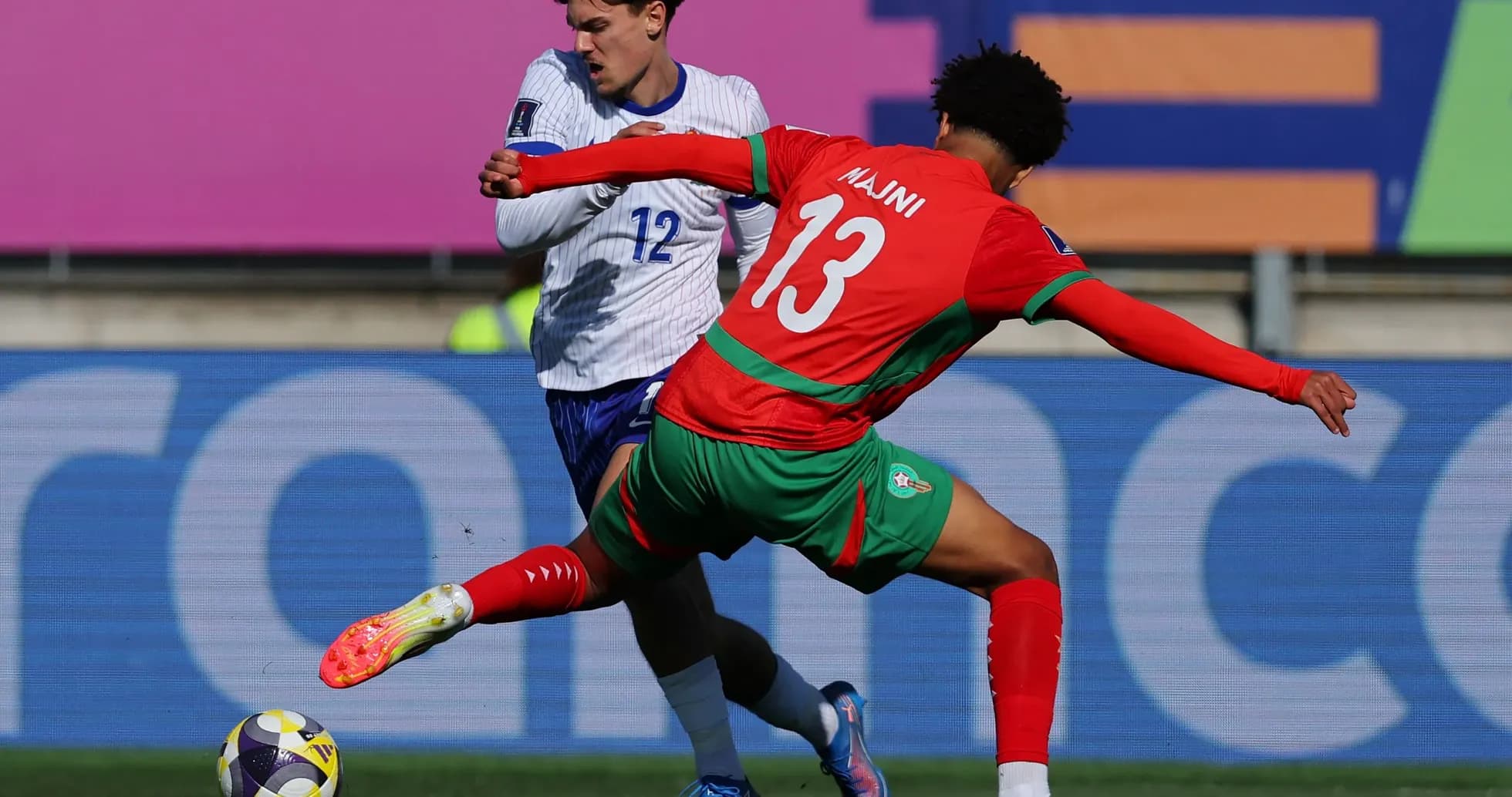 Player tackling opponent during football match Player tackling opponent during football match