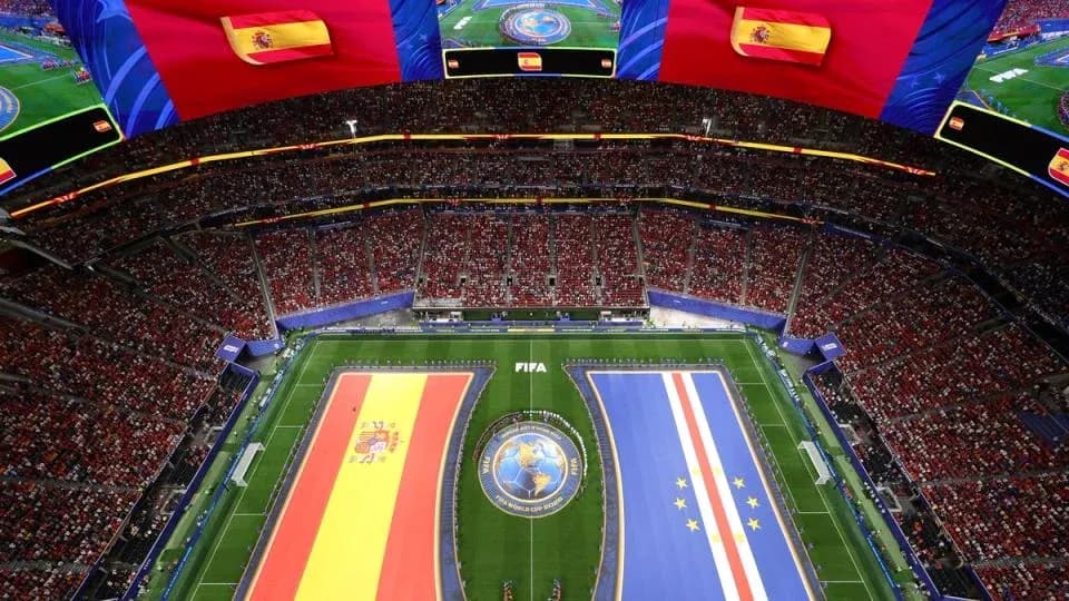 Stadium filled with fans, Spain and Cape Verde flags displayed Stadium filled with fans, Spain and Cape Verde flags displayed