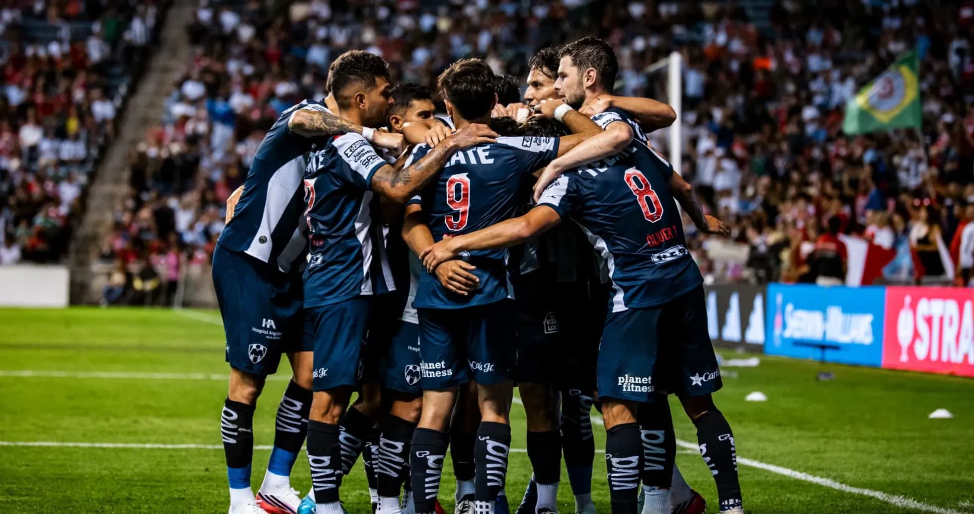 Monterrey players celebrating a goal Monterrey players celebrating a goal