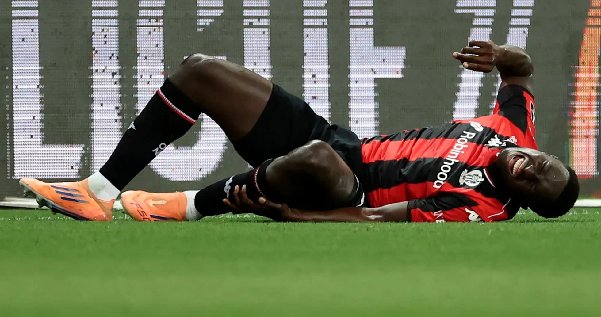 Player lying on ground after injury during match Player lying on ground after injury during match