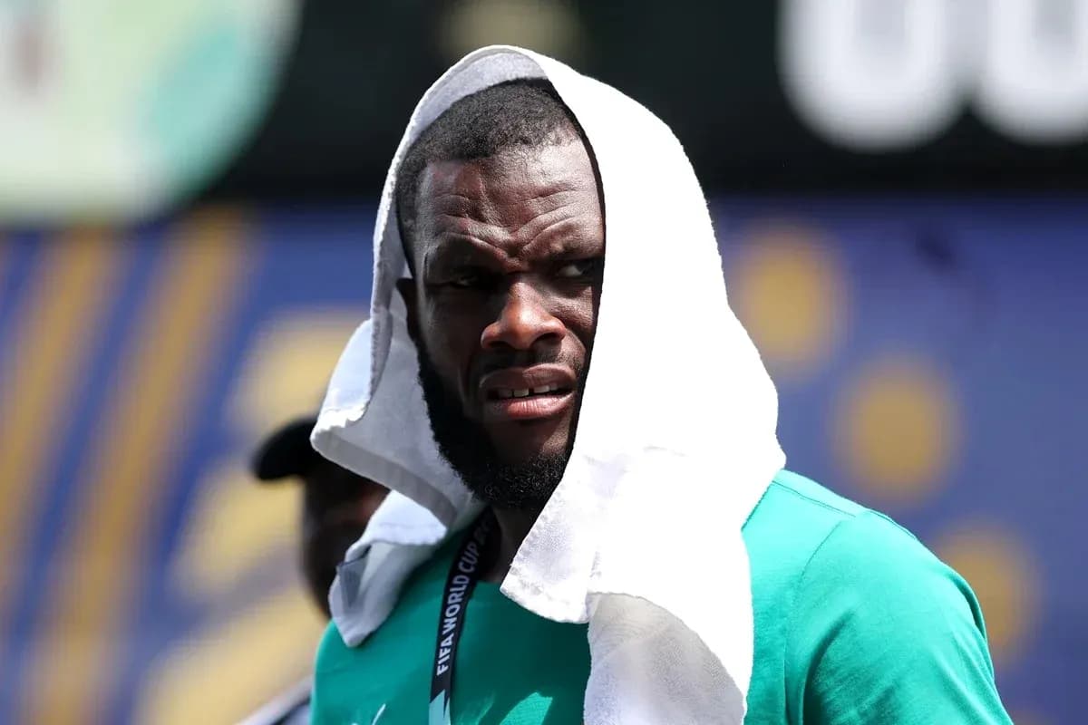 Athlete wearing a towel during training session Athlete wearing a towel during training session