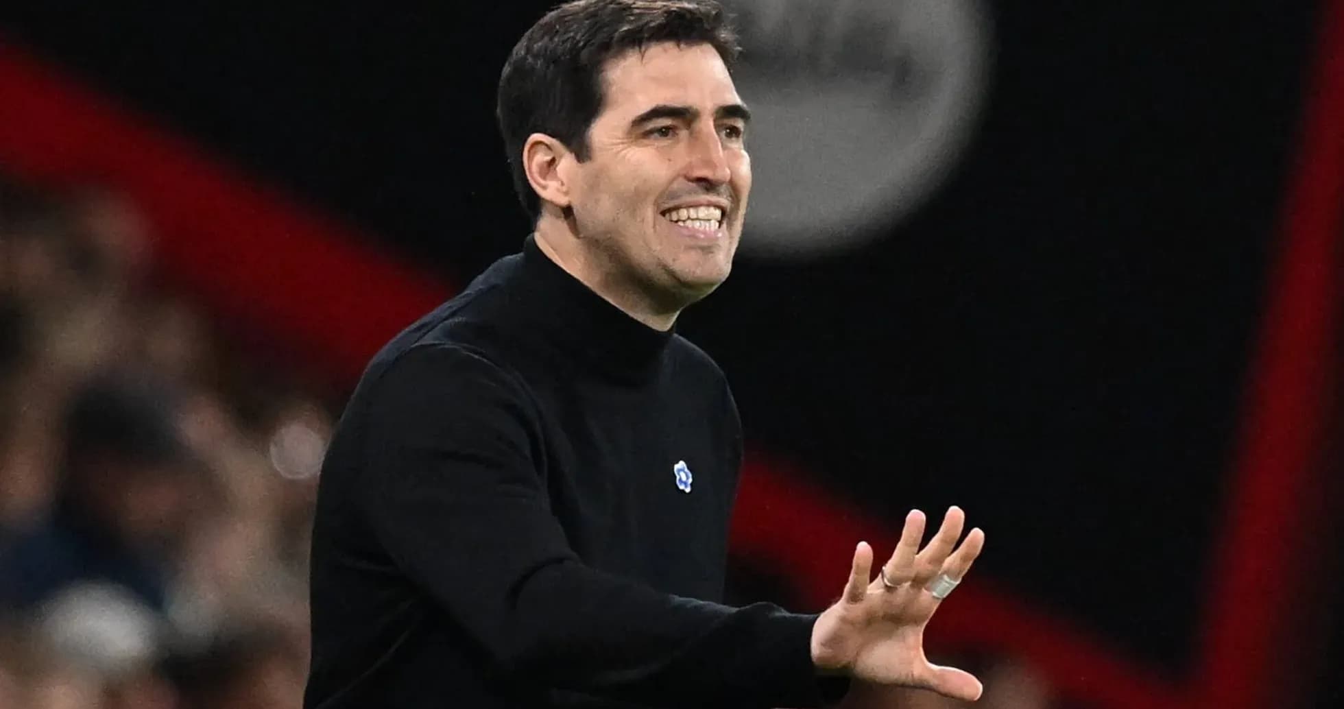 Coach gesturing during match on the sidelines Coach gesturing during match on the sidelines