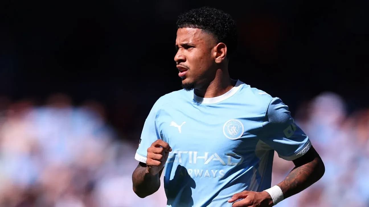 Player running on the field in Manchester City kit Player running on the field in Manchester City kit