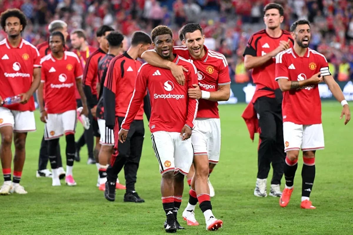 Manchester United players celebrating after match victory Manchester United players celebrating after match victory
