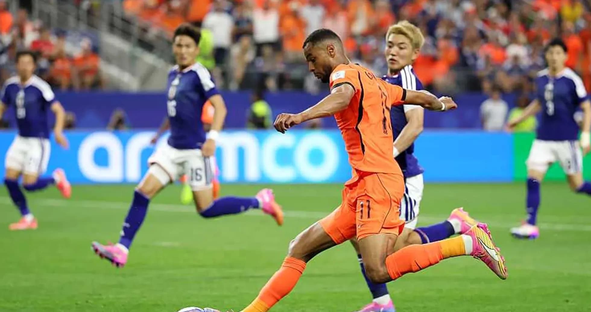 Dutch player shooting during match against Japan Dutch player shooting during match against Japan