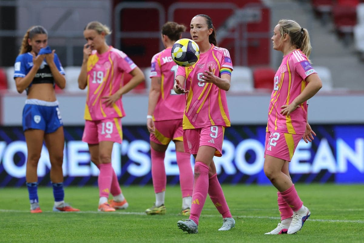Players on the field during a women's football match Players on the field during a women's football match