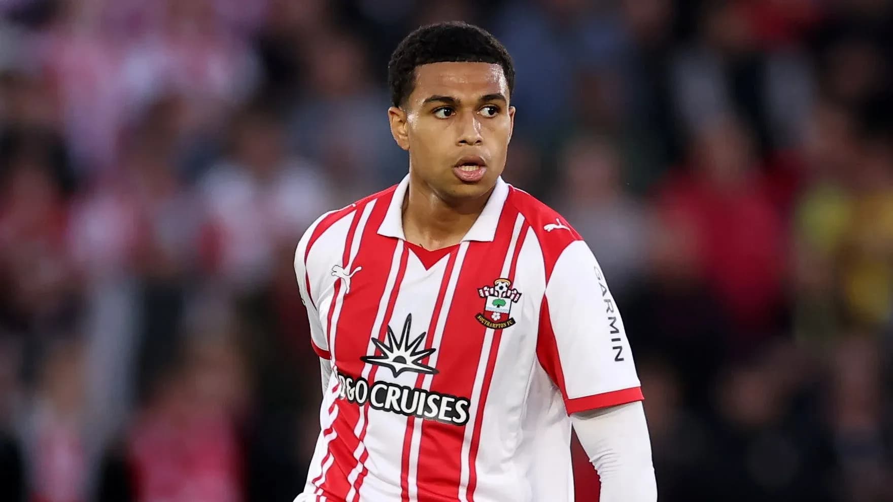 Player in Southampton FC kit during match Player in Southampton FC kit during match