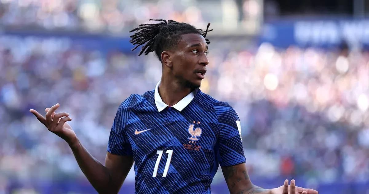 Player gesturing during a football match Player gesturing during a football match