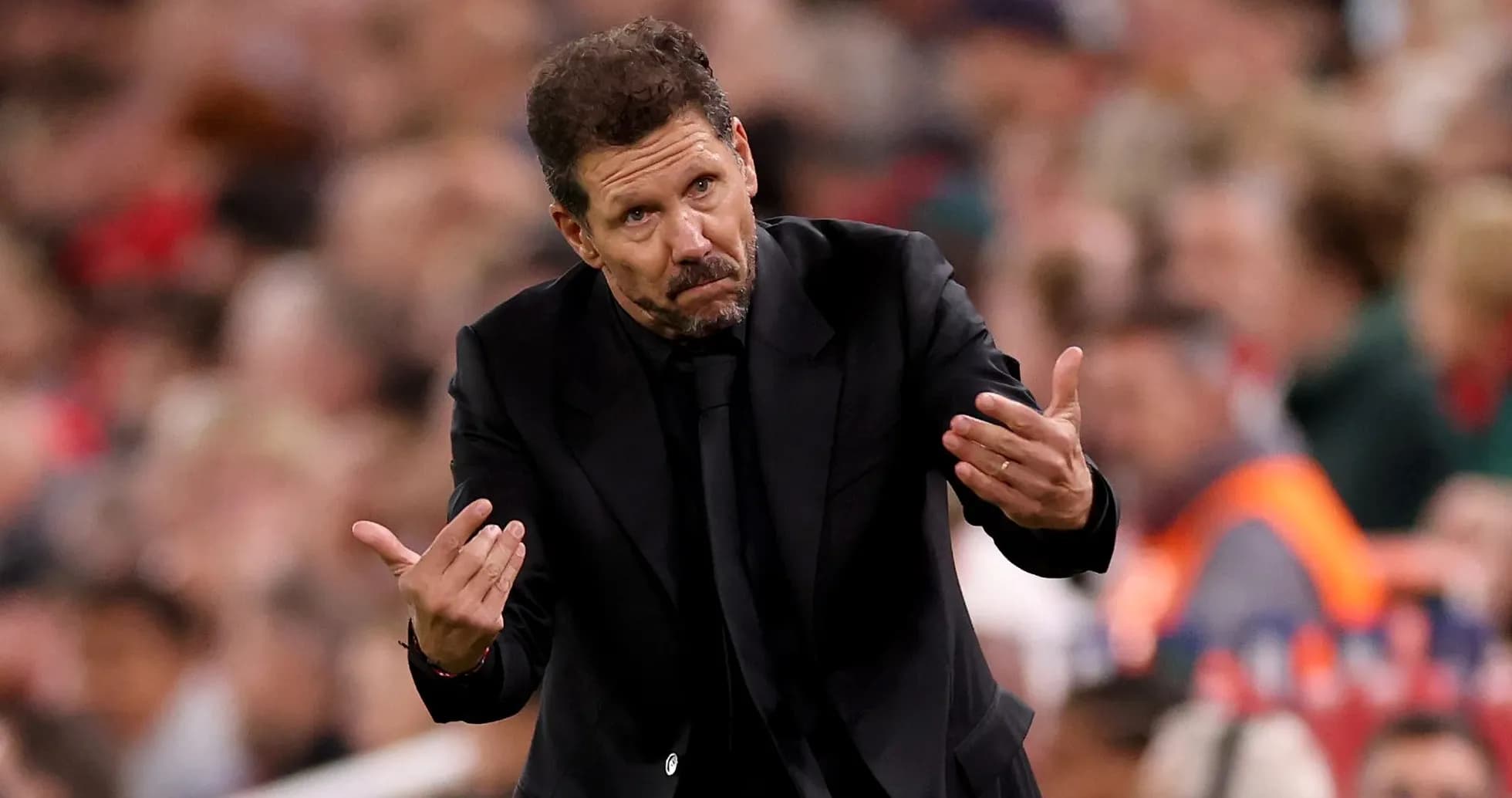 Coach gesturing during a match on the sidelines Coach gesturing during a match on the sidelines
