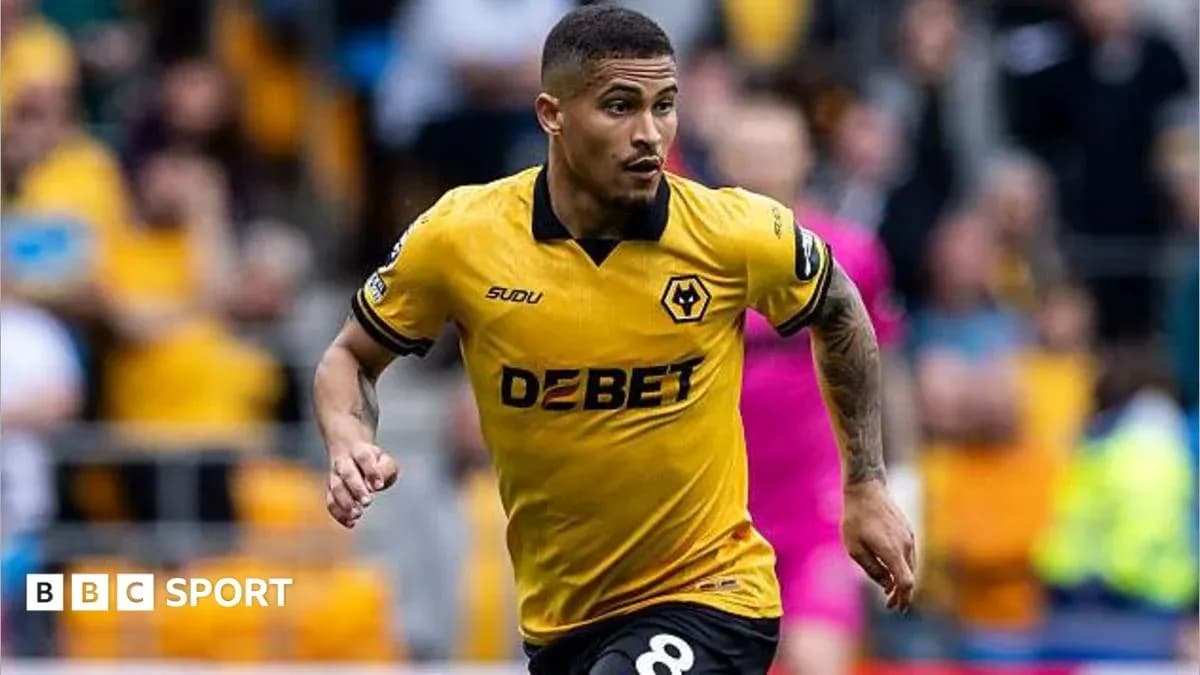 Wolverhampton player running during match action Wolverhampton player running during match action