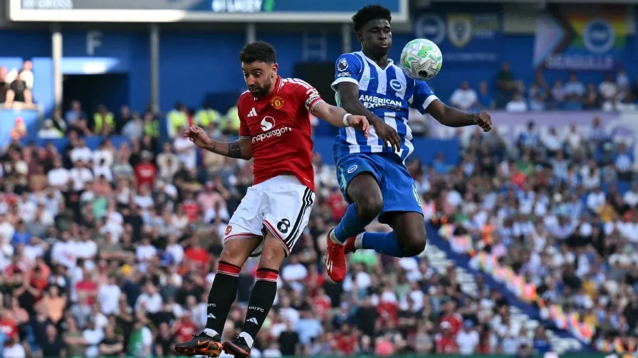 Player attempting to head the ball during match Player attempting to head the ball during match