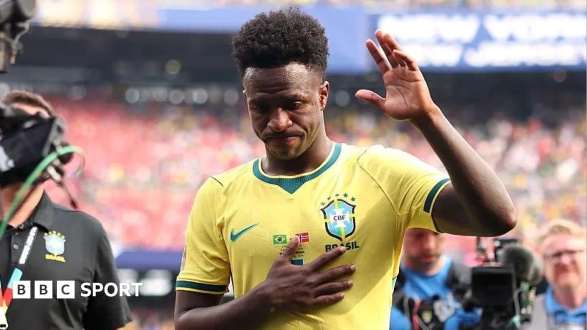 Player in Brazil kit waving during post-match Player in Brazil kit waving during post-match