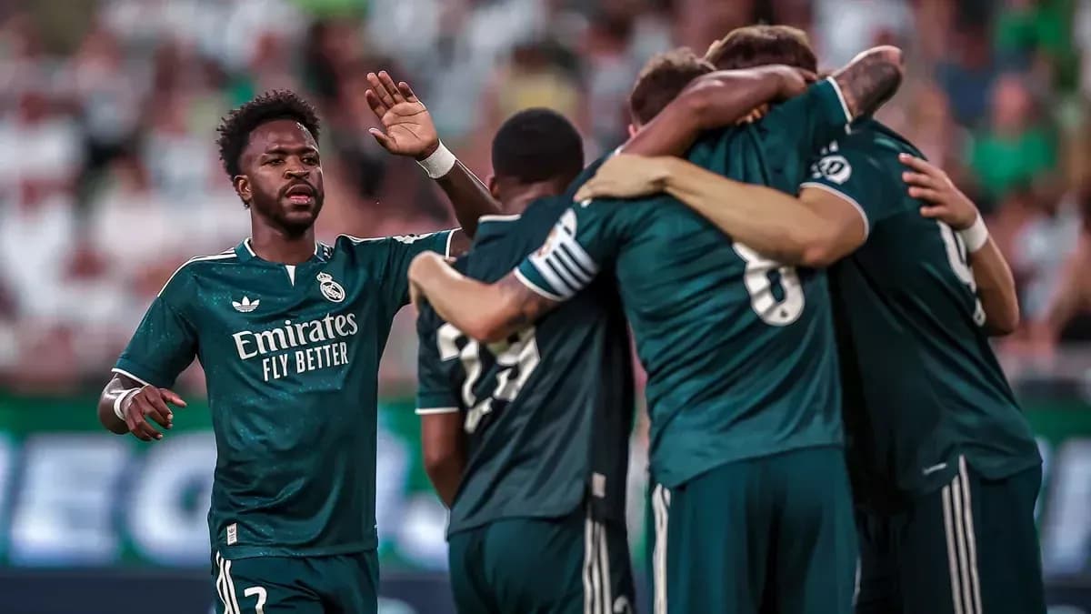 Real Madrid players celebrating a goal Real Madrid players celebrating a goal
