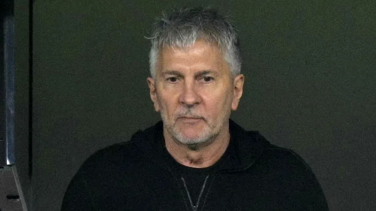 Man with gray hair wearing black hoodie Man with gray hair wearing black hoodie