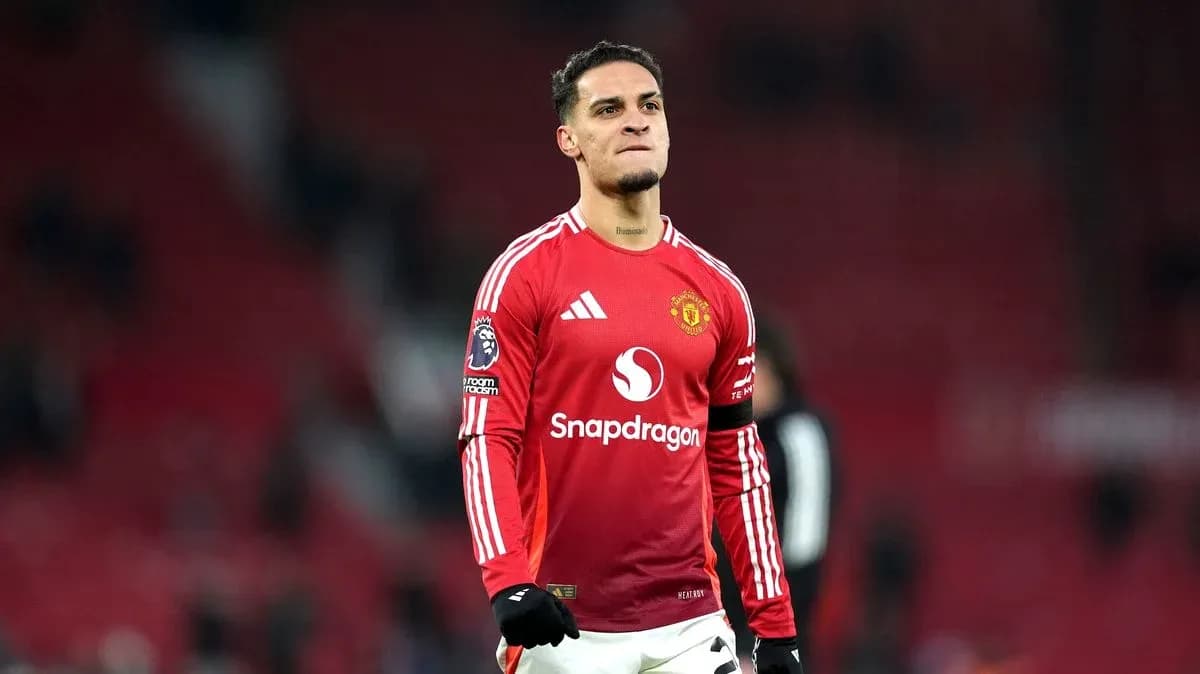 Player celebrating after match in Manchester United kit Player celebrating after match in Manchester United kit
