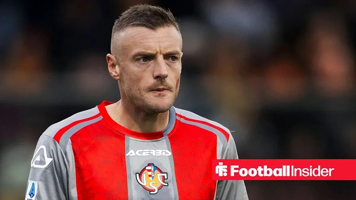 Player in gray and red kit during match Player in gray and red kit during match