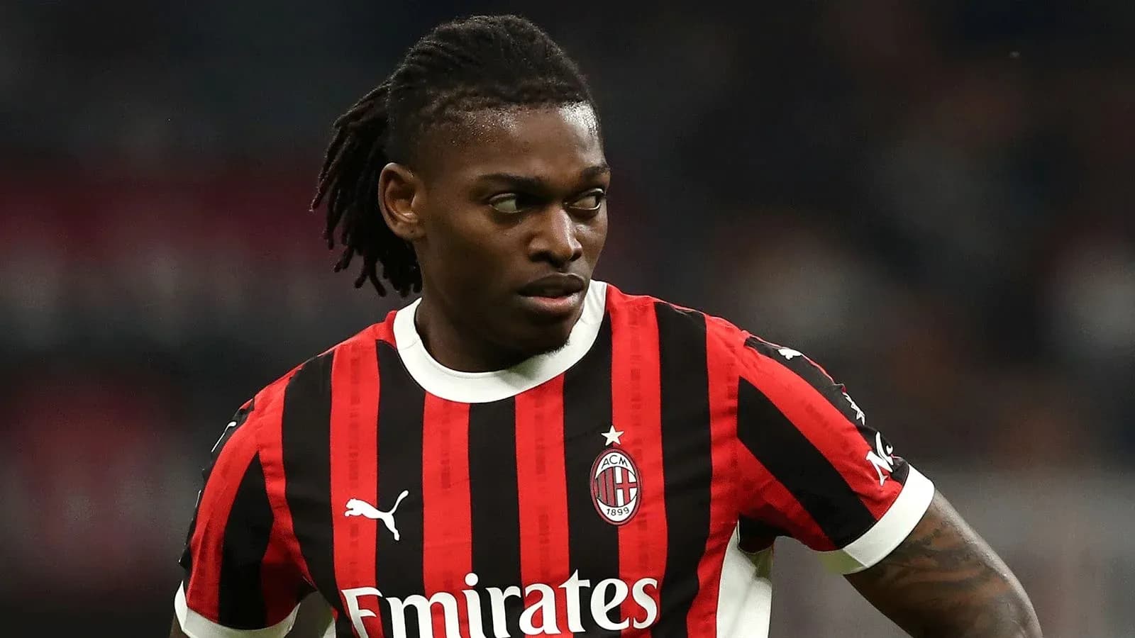 Player in AC Milan jersey during match Player in AC Milan jersey during match